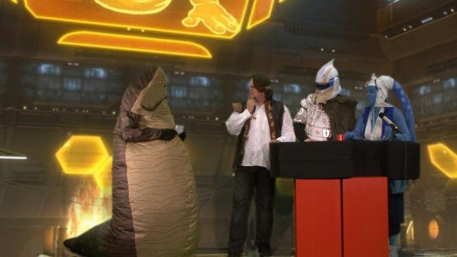 In der neuen Folge der Star Wars: The Old Republic-Persiflage müssen sich die Nerds der Quiz-Show 'Den Schwächsten frisst der Gundark!' stellen. Hutten als die perfekten Couch-Potatoes stehen halt auf Nachmittagsfernsehen.