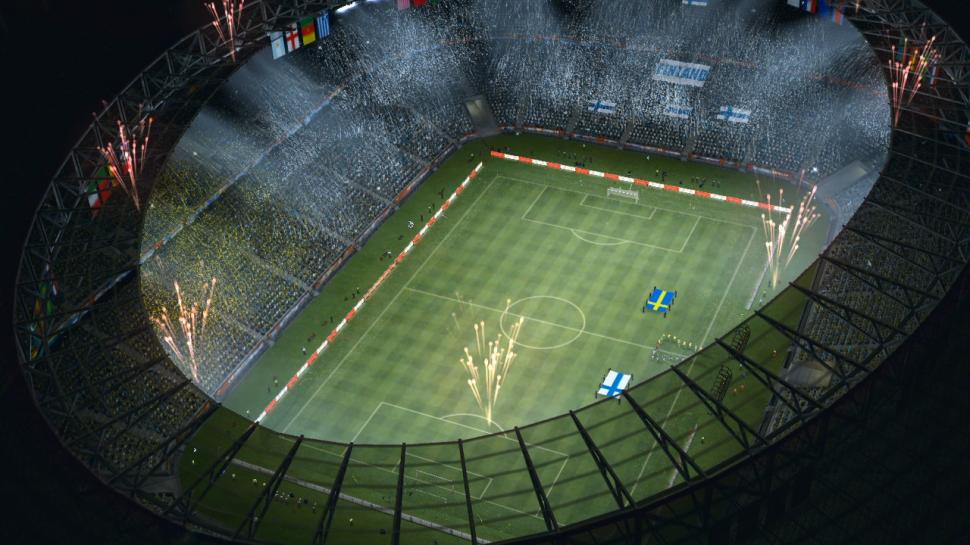 [27/04/10] Luftaufnahme: Vor den Spielen seht ihr die Stadien von oben, bei Nacht und mit Feuerwerk gleich doppelt beeindruckend.