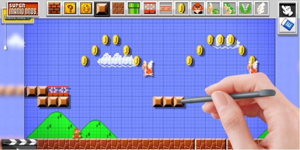 Mario Maker im Test: Die Hand ist im Grunde ein optisches Gimmick, da sie nur auf dem Fernsehbildschirm zu sehen ist. Im Bau-Modus schaut ihr ausschließlich nur auf das Touchpad.