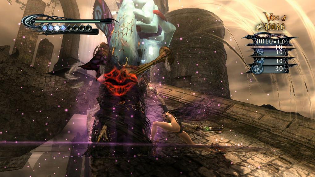 Besonders harte Kombos schließt ihr mit so einem Move ab, bei dem Bayonetta ihre Haare zu einer Faust formt.