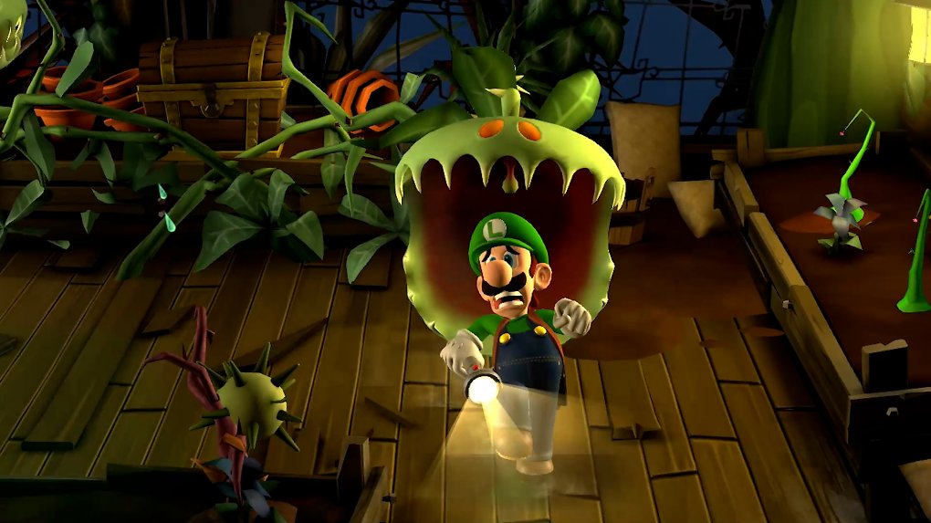 Eine große Pflanze schnappt nach Luigi.