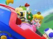 Peach und Bowser Junior sitzen zusammen mit Toads in der Jubelbahn