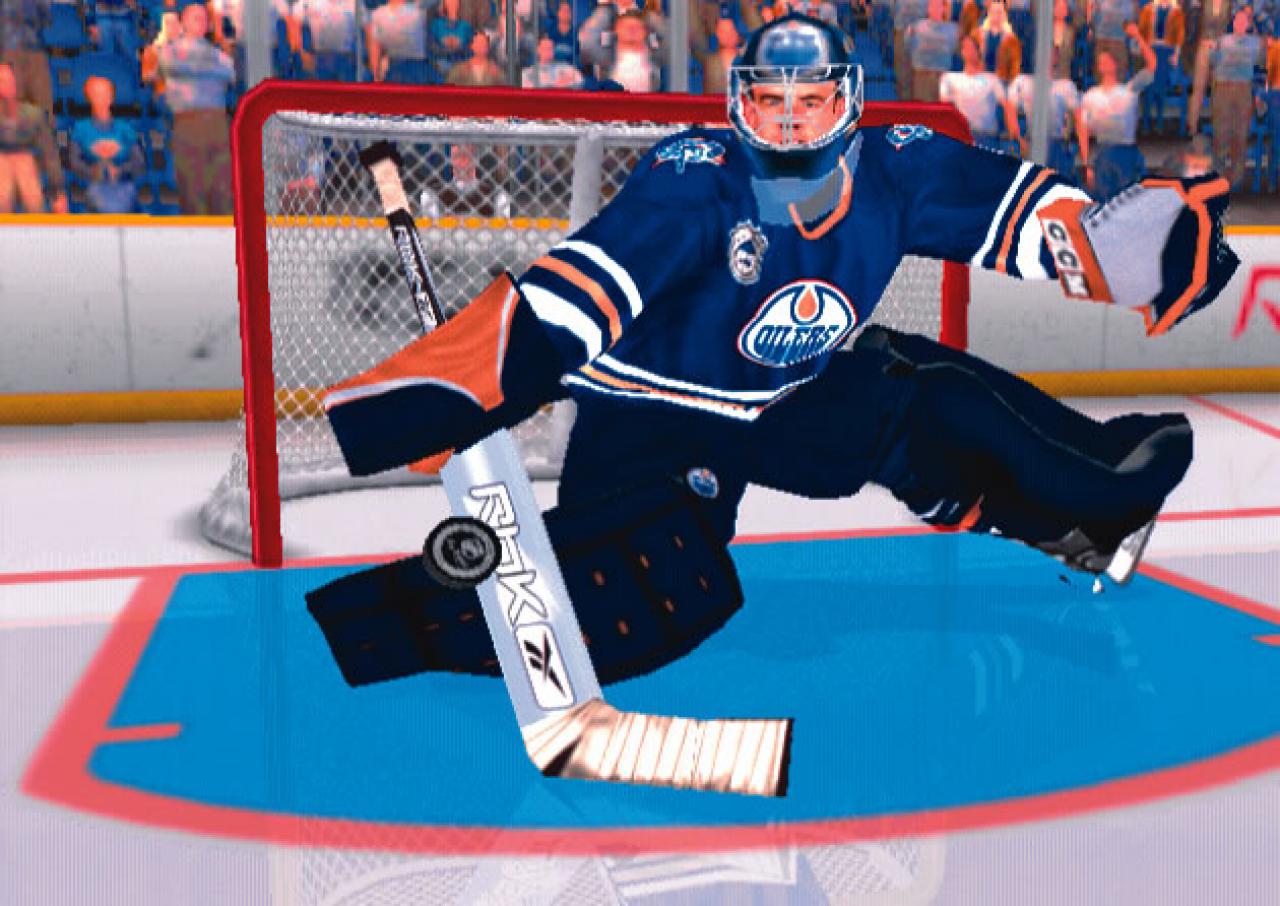 [03/04/2006] Der Goalie kannden Puck gerade noch abwehren. 