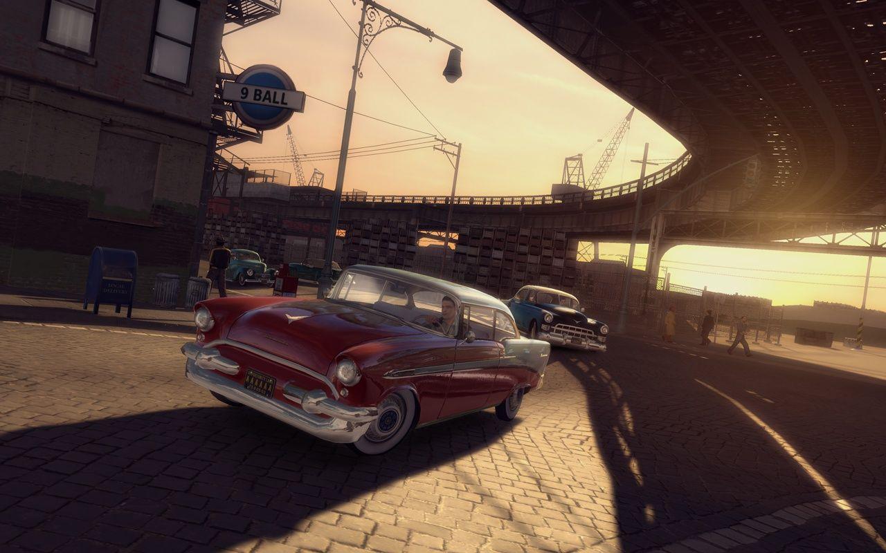 [07/03/2008] Empire Bay aus Mafia 2: Passanten, geheimnisvolle Hinterhöfe und eine brillante Atmosphäre: Empire Bay lebt! Zwar lassen sich hier leider nur Objekte wie Fahndungsplakate und Playboy-Cover sammeln, einen Ausflug ist Empire Bay aber immer wieder wert. Auto schnappen, Radio einschalten und das Flair genießen.