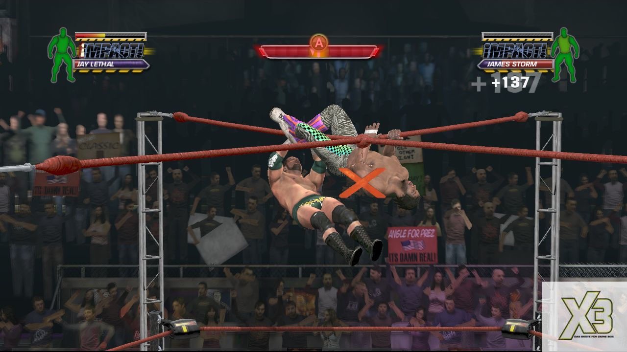 [08/09/2008] X3 - Xbox 360 - TNA iMPACT! - In einem Ultimate-X-Match hangeln die Kontrahenten an zwei Seilen über dem Ring entlang und balgen sich um das rote X.