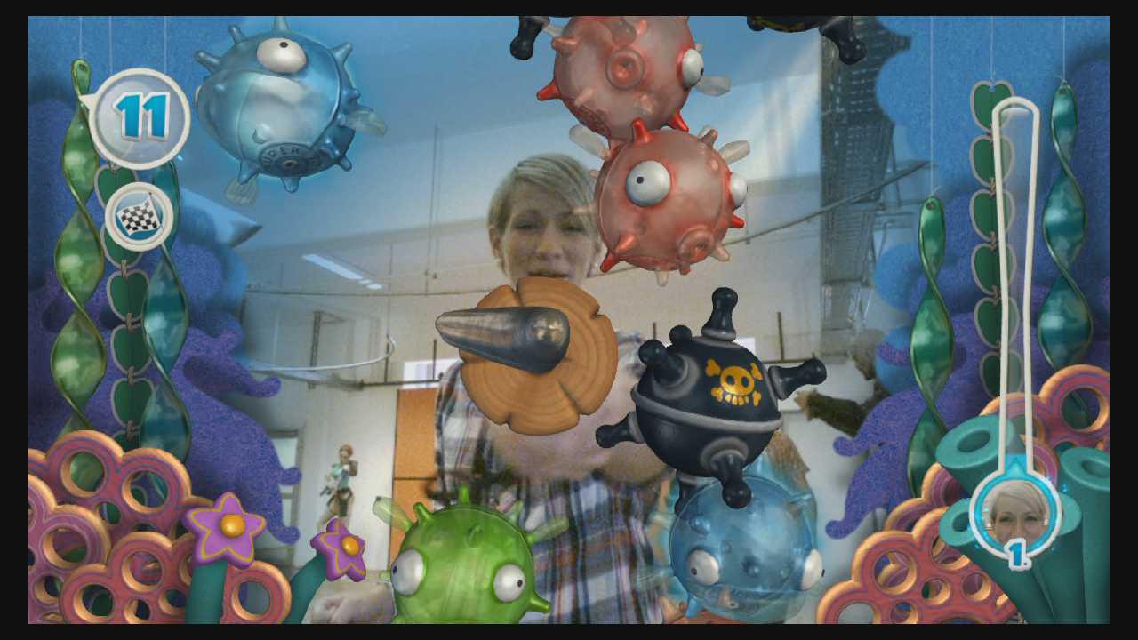 [31/08/2010] In die Tiefe: Hier lässt unsere Layouterin Fische zerplatzen. Dazu muss sie den Controller wirklich in die Tiefe bewegen.