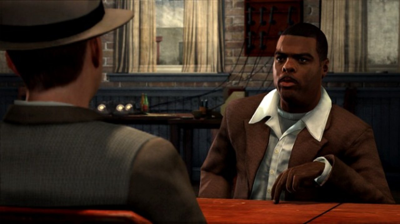 [12/05/2011] 2. Bekannte Schauspieler - Einige bekannte Gesichter aus US-Serien und Hollywood-Filmen treten in L.A. Noire auf. In dieser Szene ist es Troy Winbush, der zum Verhör antritt. Die bekannten Gesichter schaffen ein filmisches Flair.