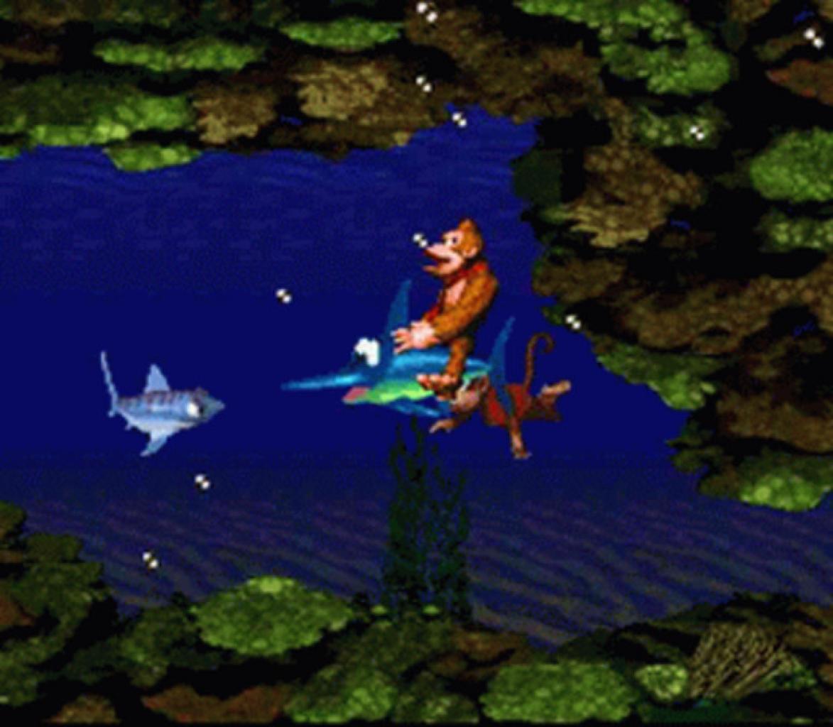 [24/10/2011] Donkey Kong Country - Coral Capers - Dieses Unterwasser-Level bietet abwechlungsreiche Herausforderungen und ein frisches Gameplay. Das Reiten auf einem Hai und stärkere Gegner gefallen uns genauso wie das tolle Design.