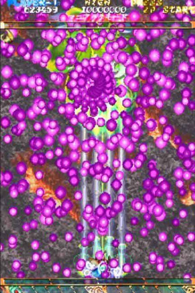 [06/10/2011] Mushihimesama - Wie ihr seht, seht ihr nichts. Dies ist ein Vertical-Scrolling-Shooter aus Japan. Auf dem Bild seht ihr einen Bosskampf. Die pinkfarbenen Kugeln sind Schüsse eures Gegners, denen ihr ausweichen müsst. Noch Fragen?!