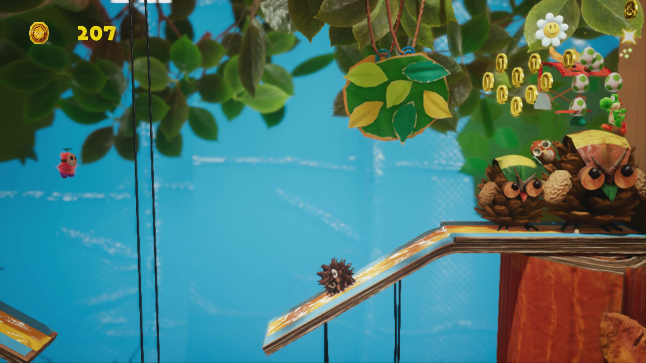 [28/03/2019] Yoshi's Crafted World: Welt 10 - Level 1: Abwägende Eicheln: Die sechste Blume des Levels findet ihr im Hintergrund in einer Wolke versteckt.