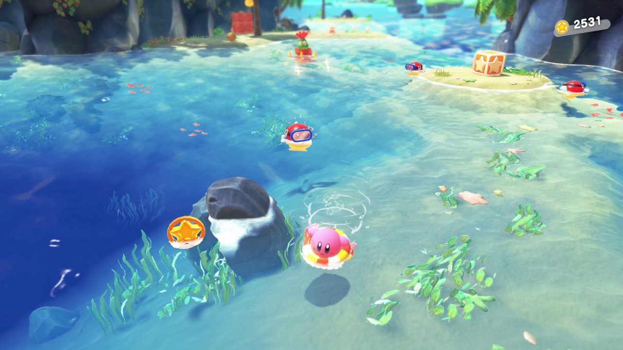 [22/03/2022] Trotz des sonnigen Ambientes scheint sich Kirby im Wasser noch nicht ganz sicher zu fühlen. Dafür hat er immerhin einen praktischen Schwimmring dabei, mit dem er herumpaddeln kann. Es ist unglaublich, aber es ist tatsächlich möglich, Kirby noch niedlicher zu machen, als er sowieso schon ist. Schwimmreif-Kirby ist einfach super. &nbsp;