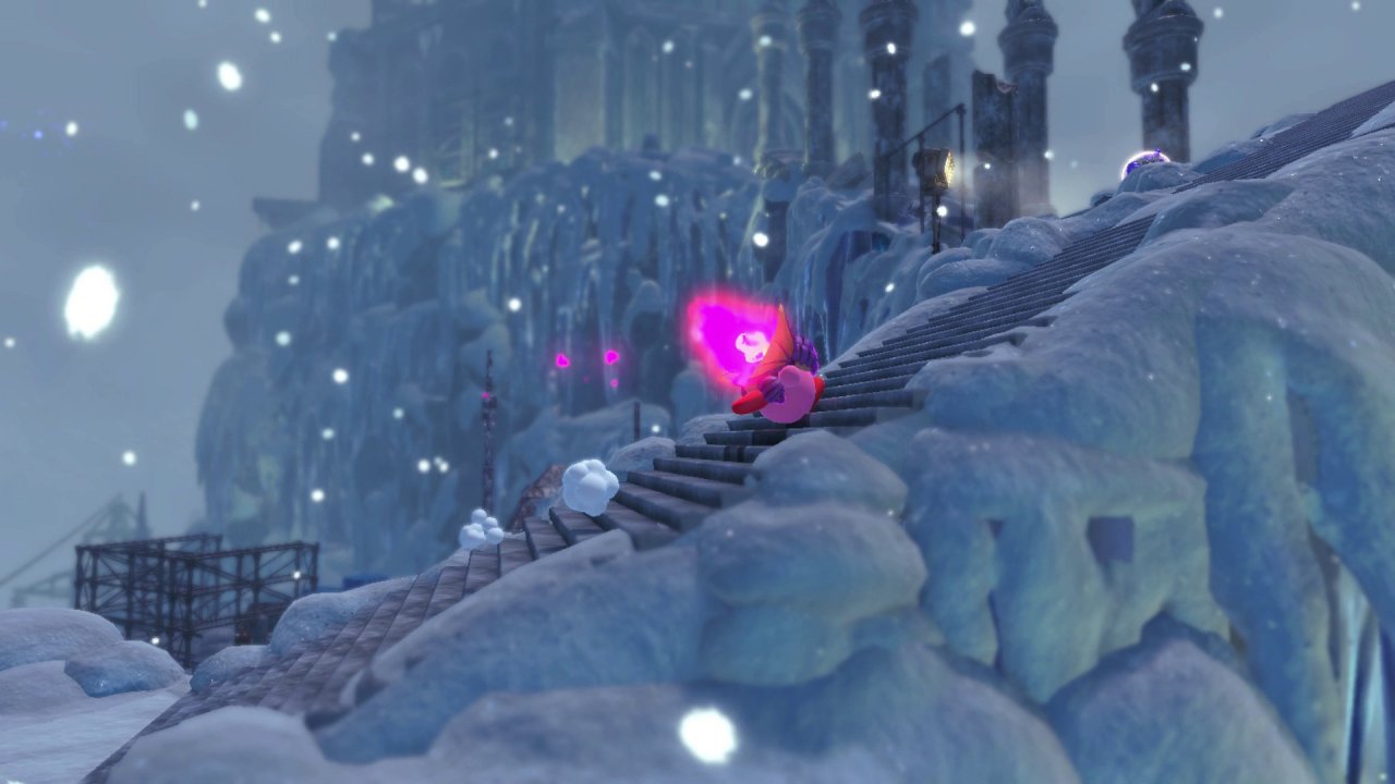 [22/03/2022] Zu diesem Bild gibt es eigentlich nicht viel zu sagen. Es ist einfach schön. Das Set-Design ist toll. Die Licht- und Partikeleffekte sind gelungen. Der Schnee ist extrem schneeig und generell ist Kirby und das vergessene Land einfach ein wunderschönes Spiel.