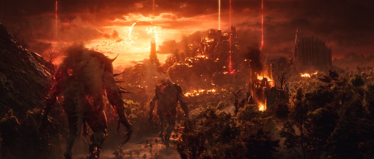 Eine blutrote Landschaft mit einem Turm in der Ferne in Lords of the Fallen