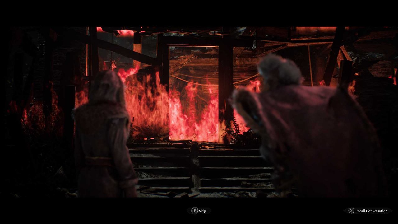 Wiktor und sein Dämon Upyr blicken auf ein Haus voller Geisterflammen.