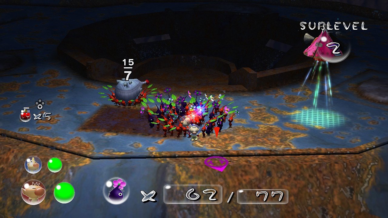 Olimar, Loui und die roten Pikmin stehen in einer Höhle.