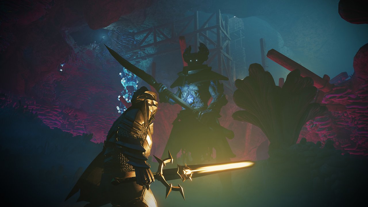 Ein Flammengeborener mit leuchtendem Schwert stellt sich einem großen Krieger.