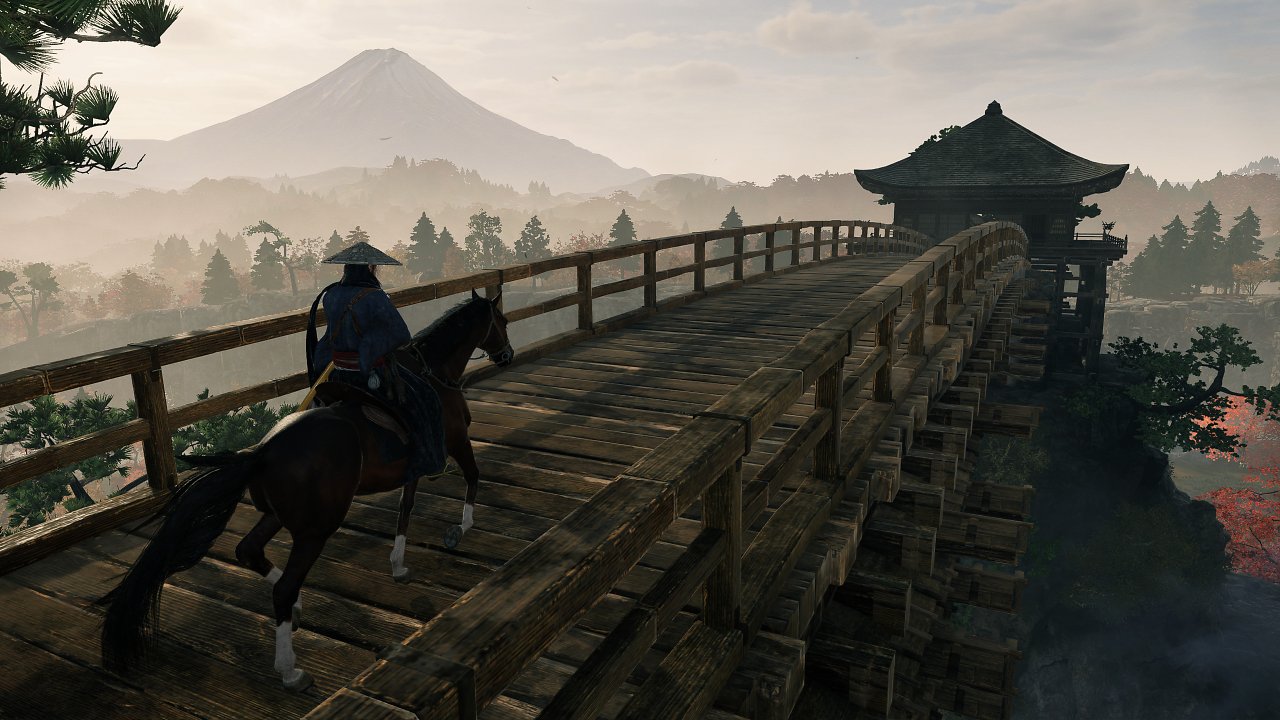 Die Spielfigur reitet über eine Brücke.