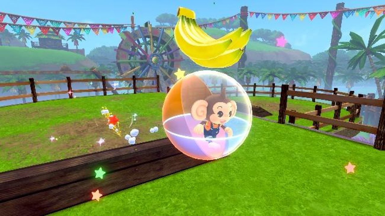 Der Affe AiAi sammelt eine Banane ein.