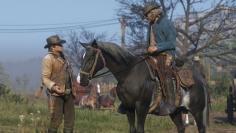 Arthur Morgan und ein NPC in Red Dead Redemption 2.