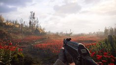 Spieler läuft über eine Blumenwiese mit einer Hütte im Hintergrund
