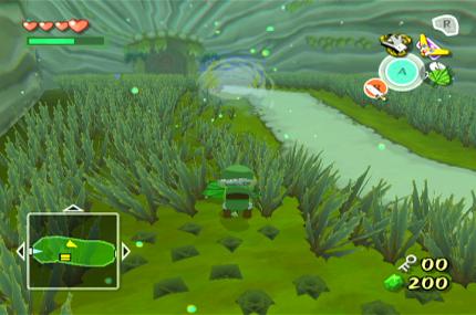 Link wirbelt das Gras mit seinem Deku-Blatt zur Seite.
