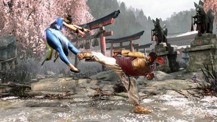 Ryu stößt Chun Li mit einem Tritt weg.