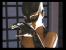 In der Pausenanimation leckt sich Catwoman ganz gen&uuml;sslich.