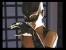 In der Pausenanimation leckt sich Catwoman ganz gen&uuml;sslich.