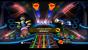 ROCK Mii AMADEUS Im Mii-Improvisationsmodus gewöhnen sich Guitar- 
Hero-Neulinge an die neuen Plastik-Instrumente. (BILD: N-ZONE)