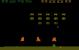 An für sich ist <strong>Space Invaders</strong> nicht selbst im Weltraum angesiedelt. Außerirdische greifen die Erde an und ihr steuert eine Kanone, um sie daran zu hindern. Aber allein schon der Fakt, dass die Außerirdischen aus dem Weltraum kommen und dass das Spiel neben Pong in den späten 1970ern dazu beigetragen hat, dass Videospiele den Durchbruch zur Massentauglichkeit geschafft haben, ist einer Erwähnung des Titels wert. Ohne <strong>Space Invaders</strong> würden Videospiele heute vielleicht nicht den gesellschaftlichen Stellenwert besitzen, wie es der Fall ist.
