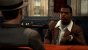<strong>2. Bekannte Schauspieler</strong> - Einige bekannte Gesichter aus US-Serien und Hollywood-Filmen treten in L.A. Noire auf. In dieser Szene ist es Troy Winbush, der zum Verhör antritt. Die bekannten Gesichter schaffen ein filmisches Flair.