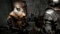 Dark Souls Komplettlösung - Einige NPCs helfen euch immens weiter. (im Bild: Der Schmied - Bezirk der Untoten)