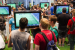 <strong>Spiele in die Promo-Konsole im Kaufhaus einlegen lassen</strong> - Bei einem coolen Verkäufer durften wir die Spiele unserer Wahl sogar in die Probe-Konsolen NES oder SNES einlegen lassen. Dieses Bild stammt von der Gamescom und zeigt, wie es damals in Kaufhäuseren aussah.