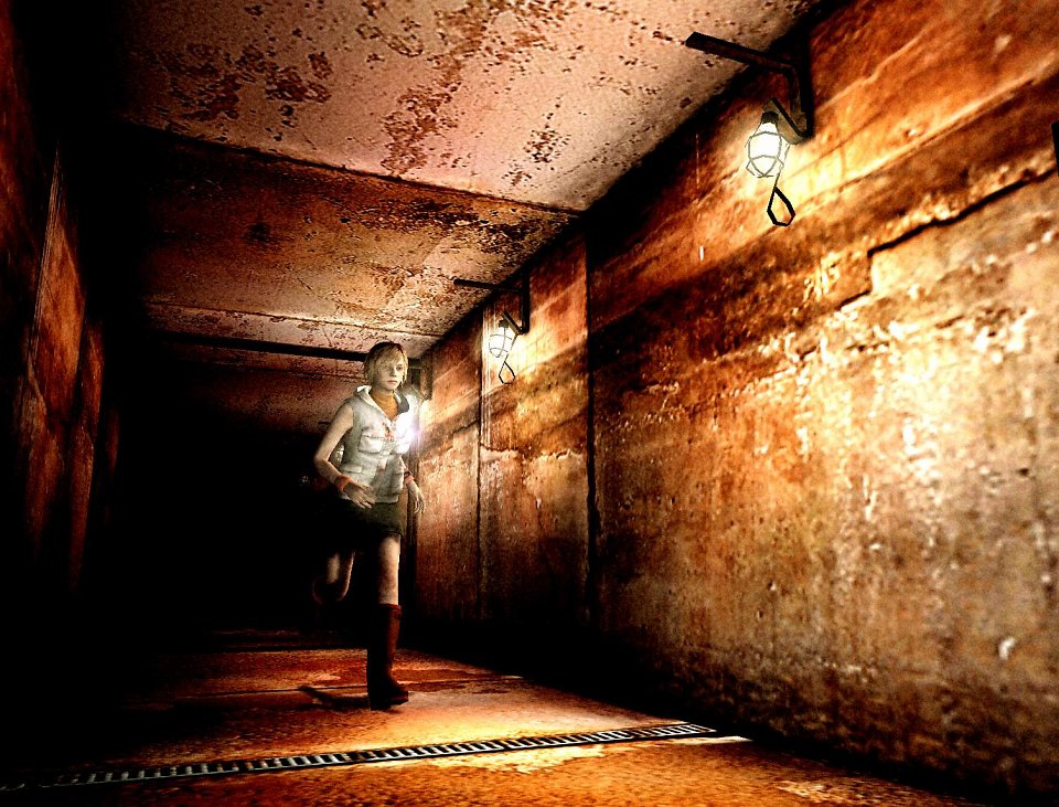 Heather Mason aus Silent Hill 3 läuft einen rostigen Gang entlang.