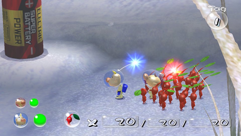 Olimar, Loui und die roten Pikmin stehen vor einer Batterie.