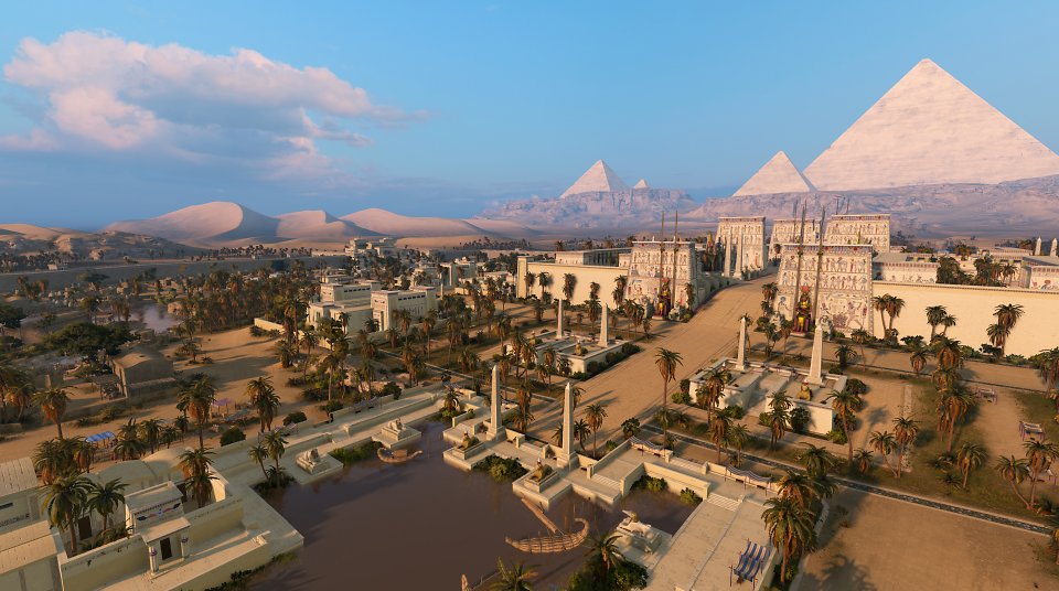 EIn Blick über die Wüste mit Pyramiden im Hintergrund